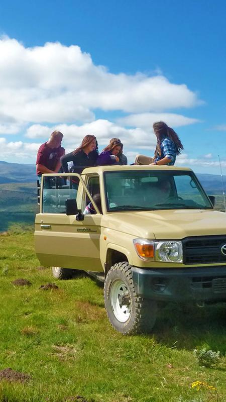 Student on a mountain Jeep ride